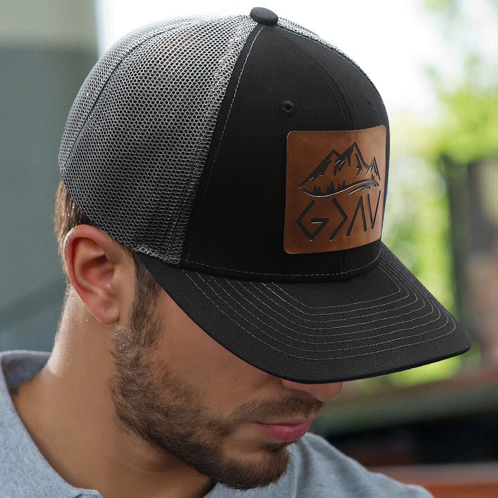 God Is Greater Than The Highs And Lows Adjustable Trucker Hat