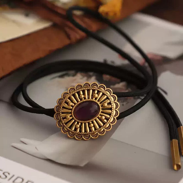 Antique Gold Medallion Dark Red Resin Bolo Tie