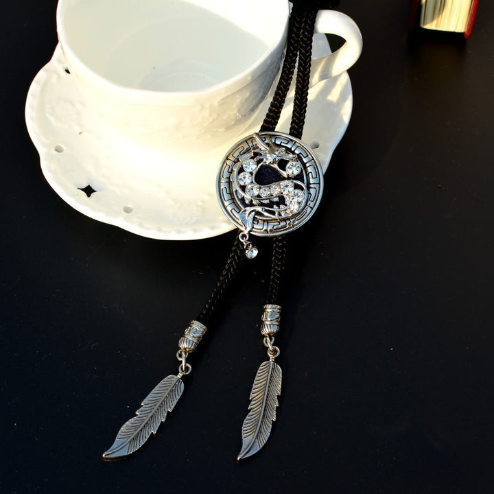 Western Rhinestone Dragon With Feather Bolo Tie